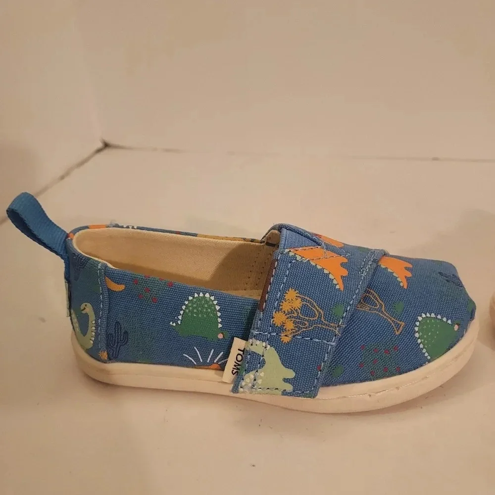 TOMS Dinoland Baby/Toddler Glow-In-The-Dark Alpargata Shoes in Size T6 Toddler